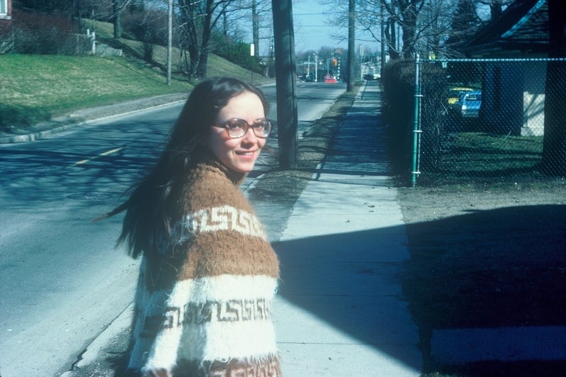 Woman in poncho in 1970s
