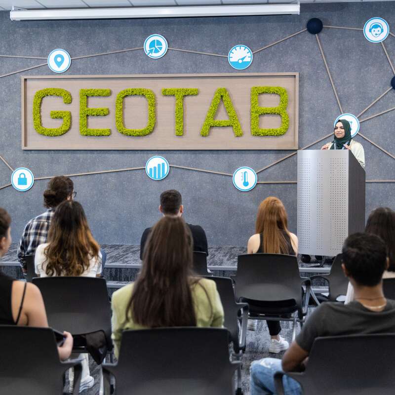 Employees at a Geotab meeting