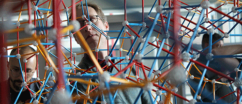 A researcher works on a 3D structure