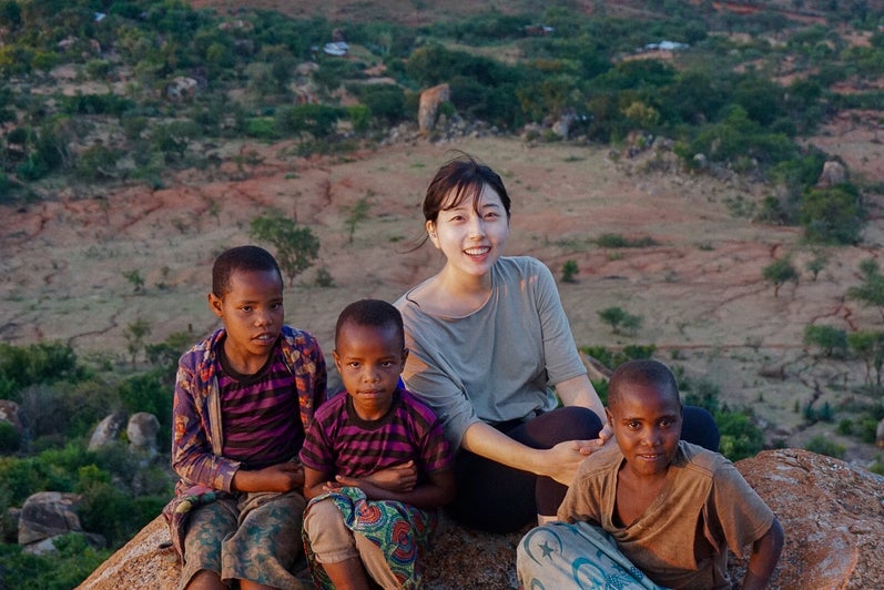 Jung In with Tanzanian children atop Haydom mountain