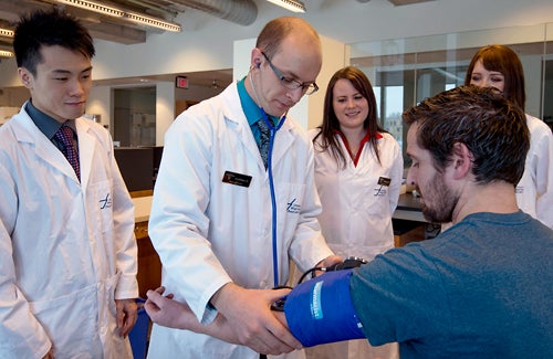 picture of pharmacy students providing patient care