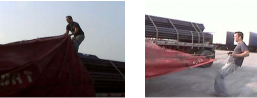 A man that is manual tarping and untarping