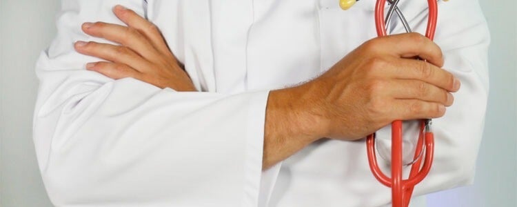 A doctor holding a stethoscope.