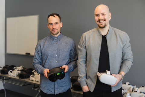 Dr. Daniel Harley and Dr. Ville Mäkelä holding Meta Quest Virtual Reality headsets